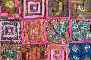 back-side-of-handcrafted-patchwork-cloth-close-up-2024-10-18-03-39-29-utc 1